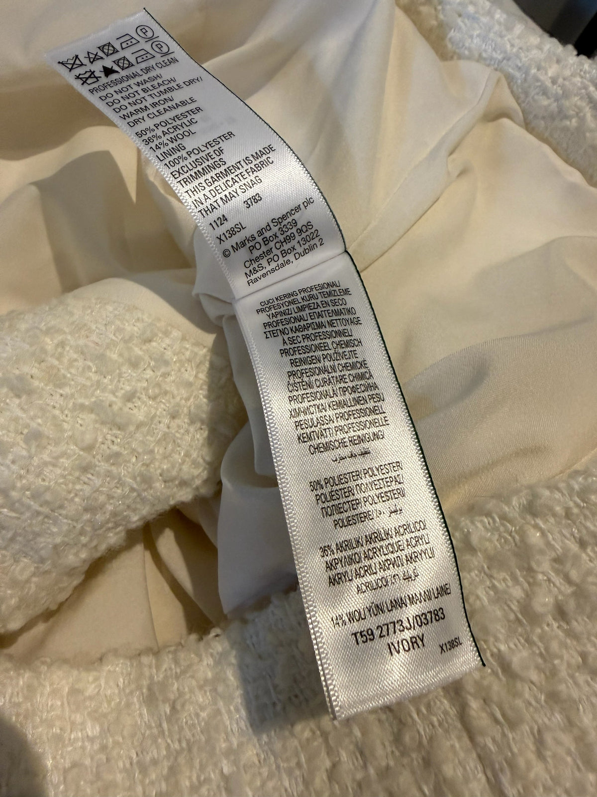 Style Reset M&S cream boucle jacket care label detailing fabric composition and professional dry clean instructions