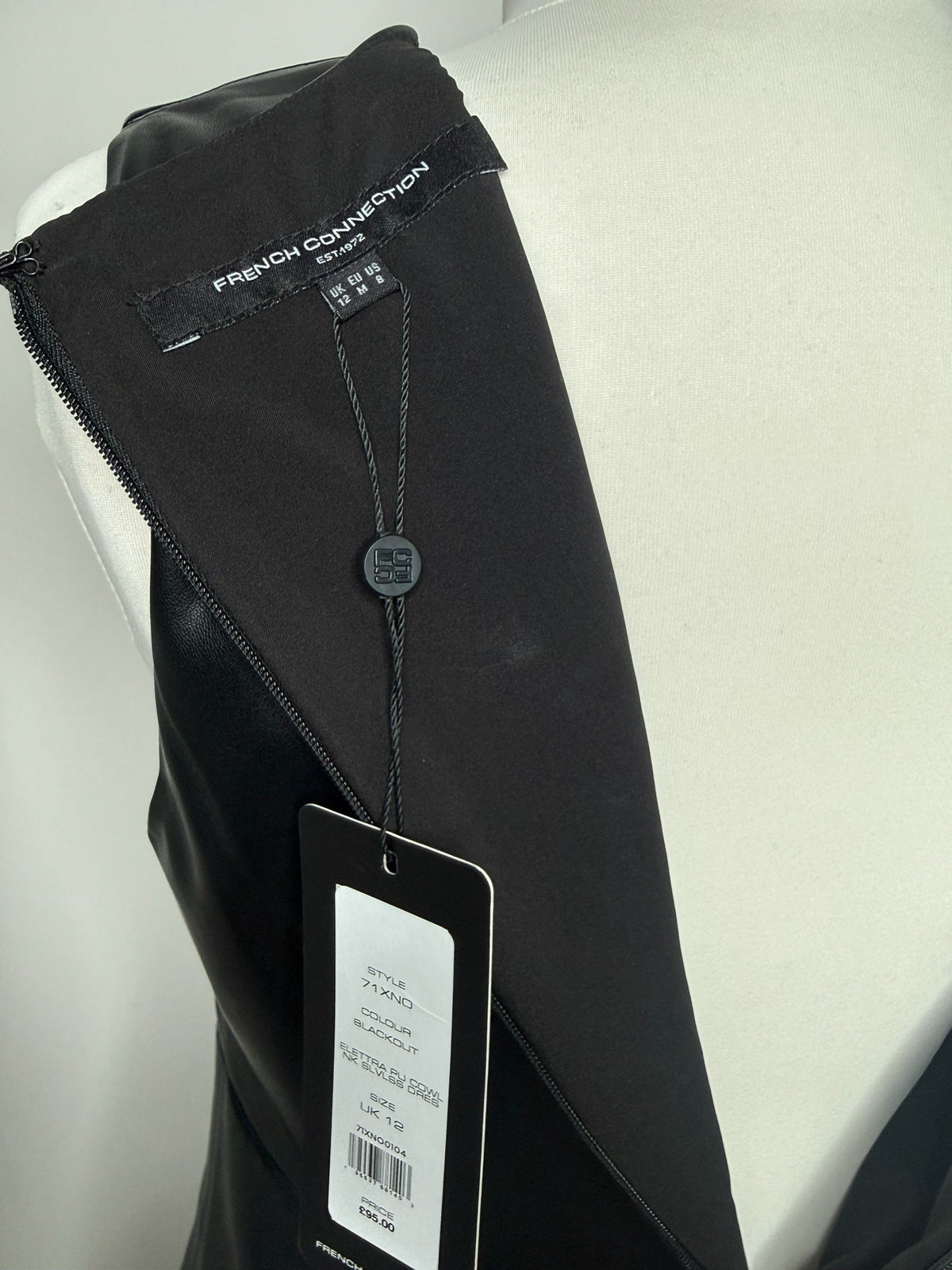 Style Reset French Connection black faux leather sleeveless midi dress with brand tag and size label on mannequin