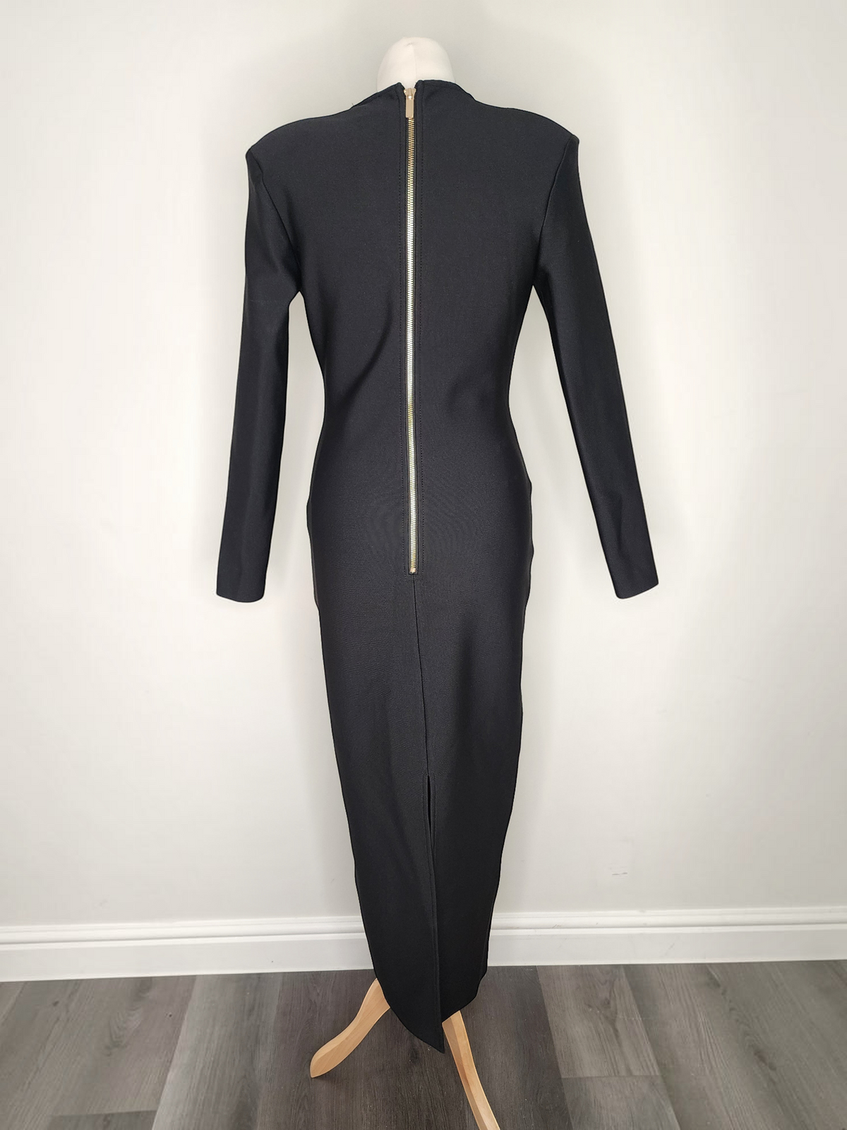 Style Reset Karen Millen black structured long-sleeve midi dress with a prominent gold back zipper