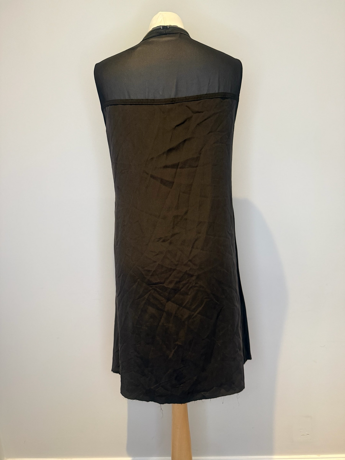 Back view of a black Style Reset AllSaints silk midi dress on a mannequin, showing the sleeveless design.