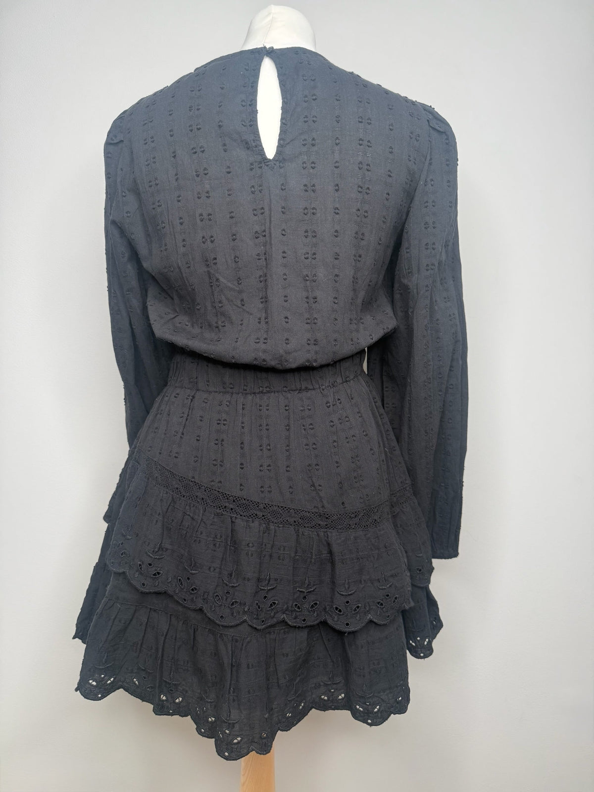 Style Reset black long sleeve mini dress in broderie anglaise with a tiered skirt and keyhole back detail