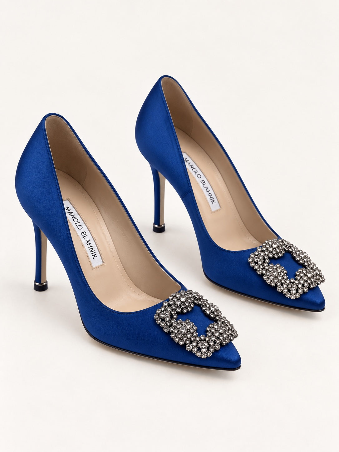 Style Reset royal blue satin stiletto court shoes with crystal-embellished buckles and pointed toes.