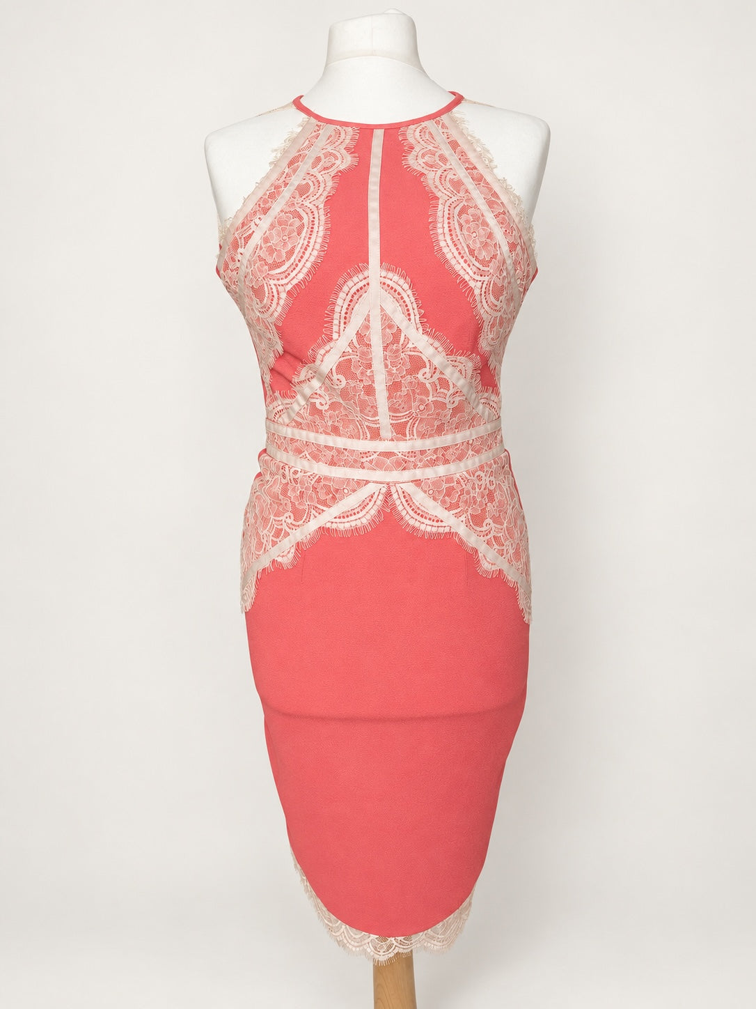 Style Reset Lipsy London coral midi dress with cream lace overlay, halter neck, and form-fitting silhouette.
