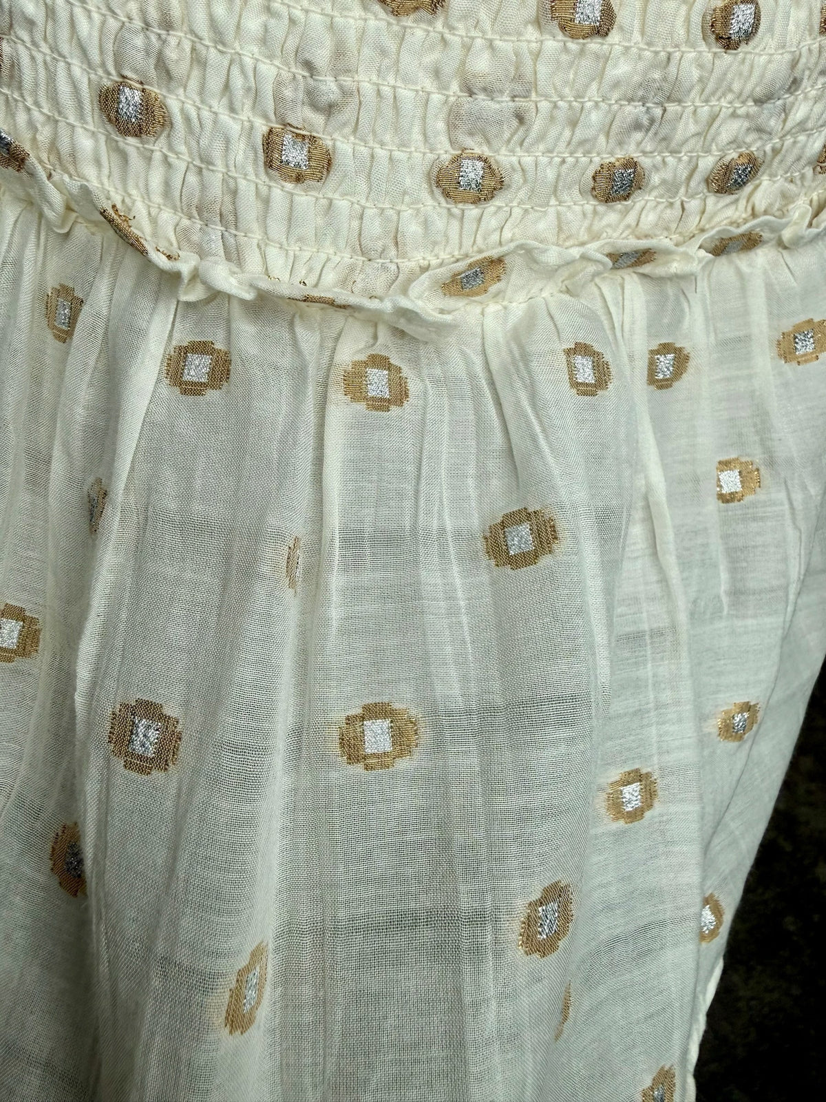 Style Reset cream tiered mini skirt with gold and silver metallic dot embroidery and a shirred elasticated waistband.