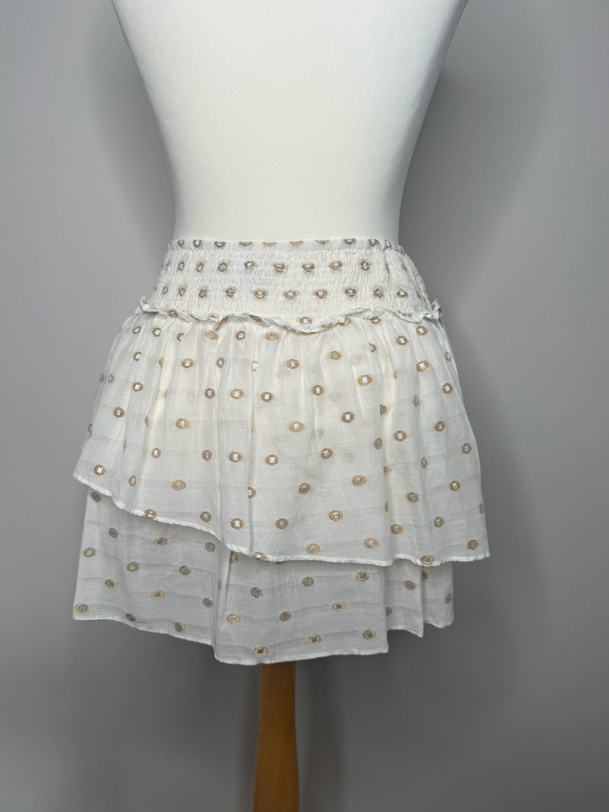 Style Reset cream tiered mini skirt with gold and silver metallic dot embroidery and a shirred elasticated waistband.
