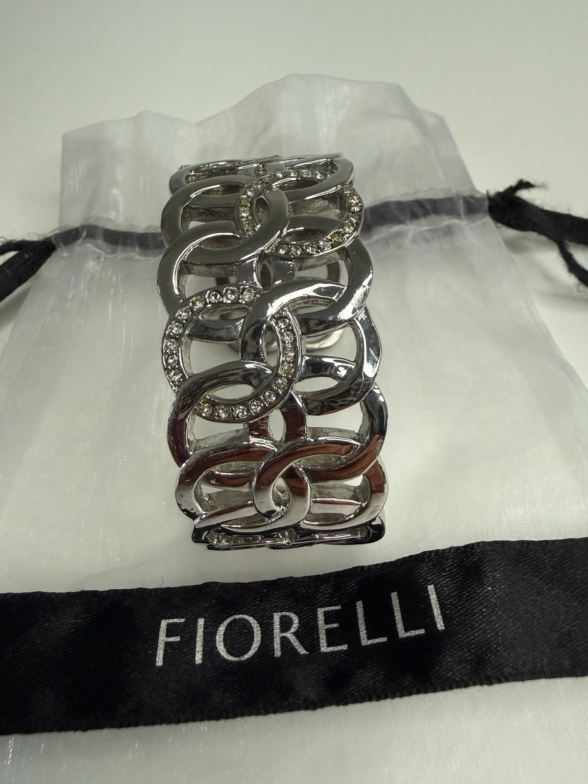 Style Reset Fiorelli silver-tone wide cuff bracelet with interlocking circles and clear crystal embellishments