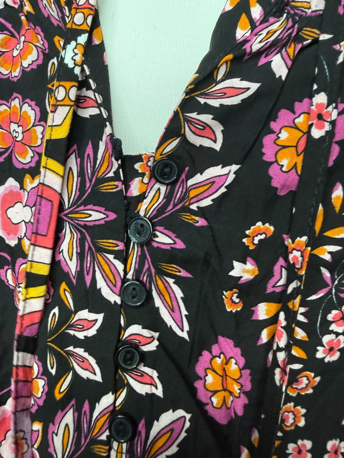 Style Reset floral print mini dress with a black base, V-neckline, and black button-down front detail.