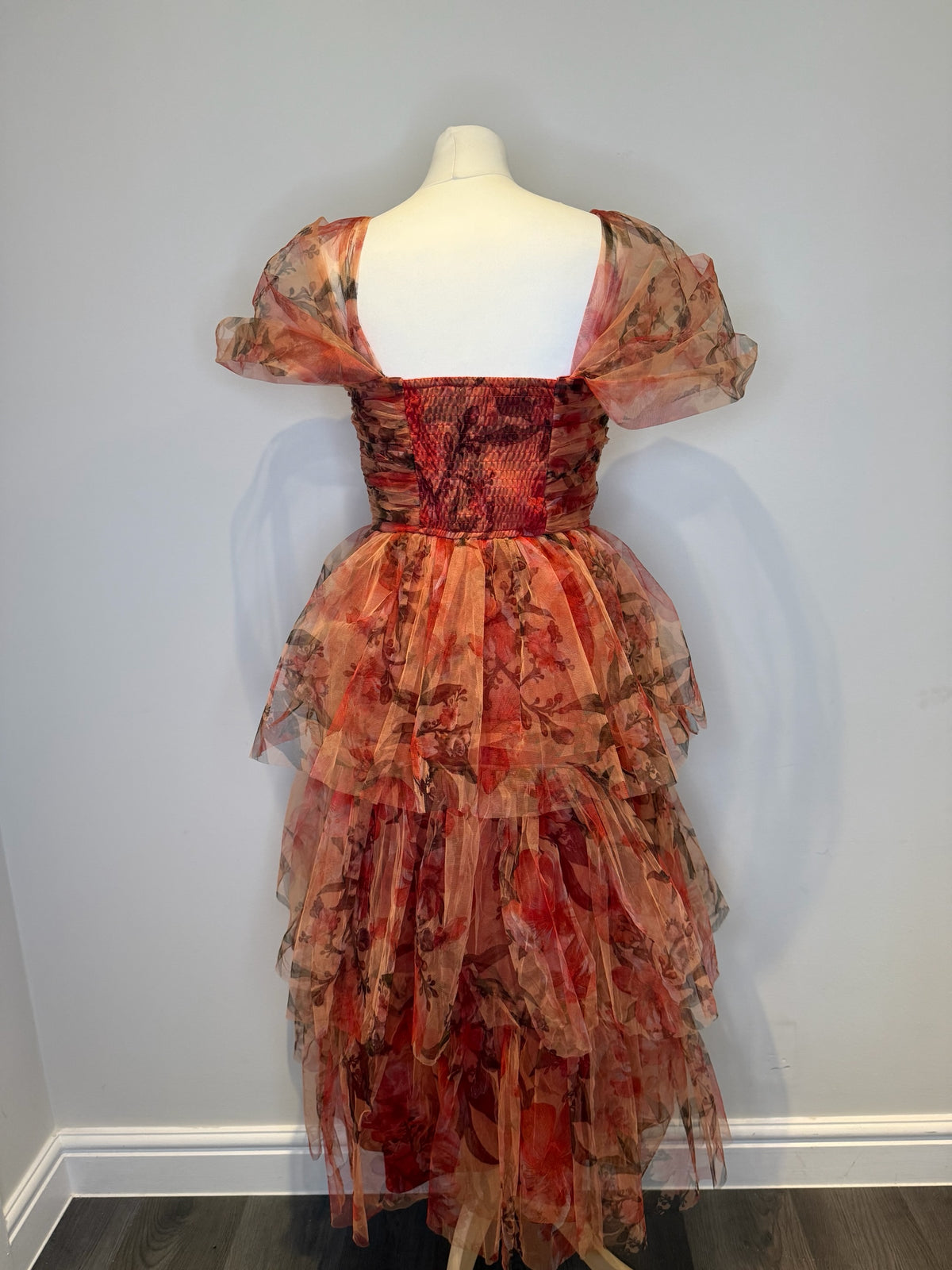 Style Reset floral print organza midi dress with tiered skirt, ruched bodice, and off-the-shoulder puff sleeves.