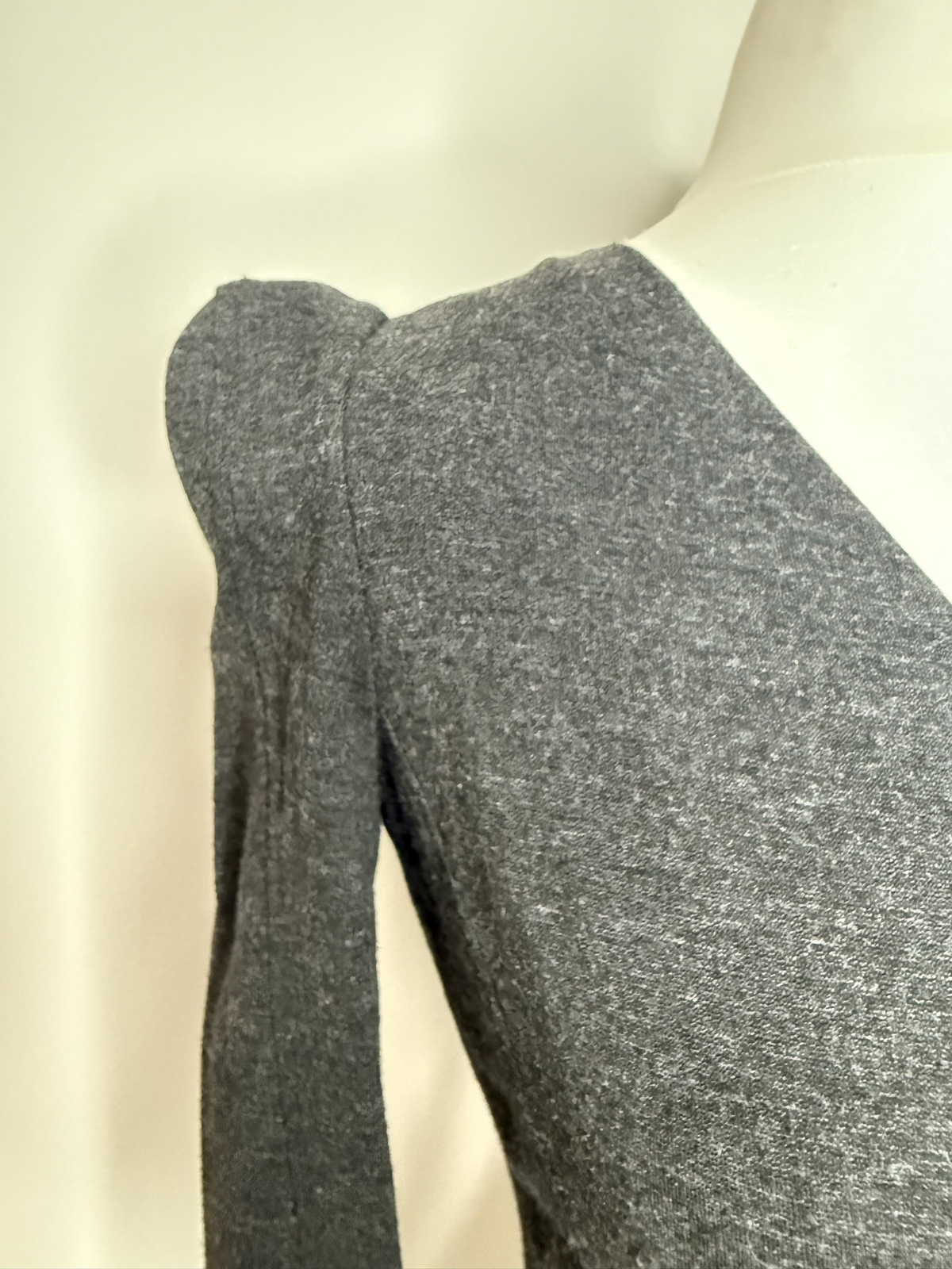 Style Reset French Connection charcoal grey long sleeve wrap dress featuring structured puff-shoulder detailing.