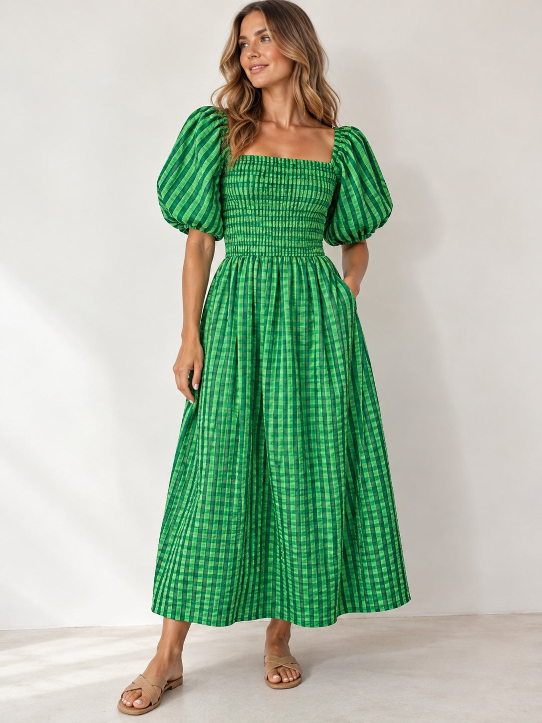 Style Reset green gingham midi dress with smocked bodice, square neckline, and puff sleeves on a model