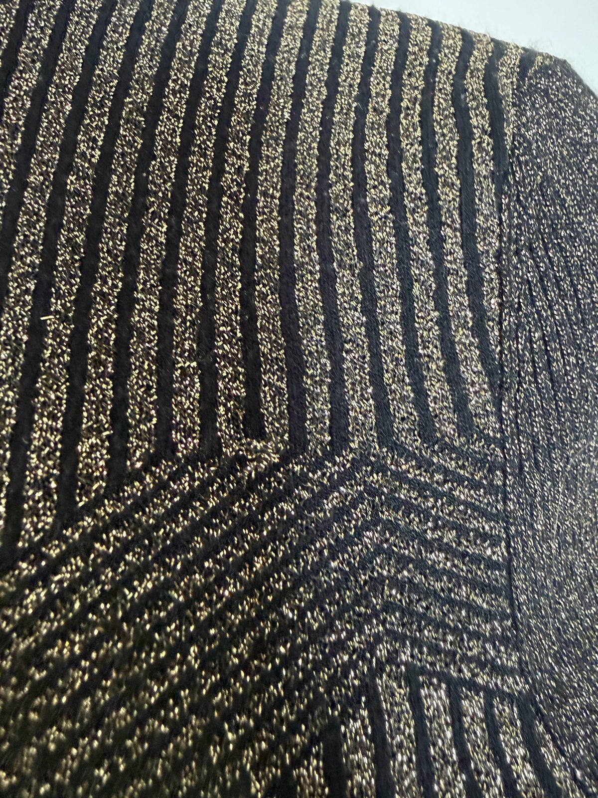 Style Reset Karen Millen black and metallic gold ribbed knit fabric with geometric texture and shimmering finish