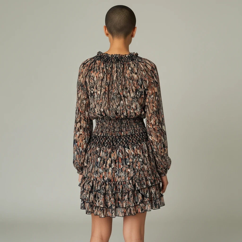 Style Reset La Redoute feather print mini dress with long sleeves, ruffled hem, and smocked waist, back view.