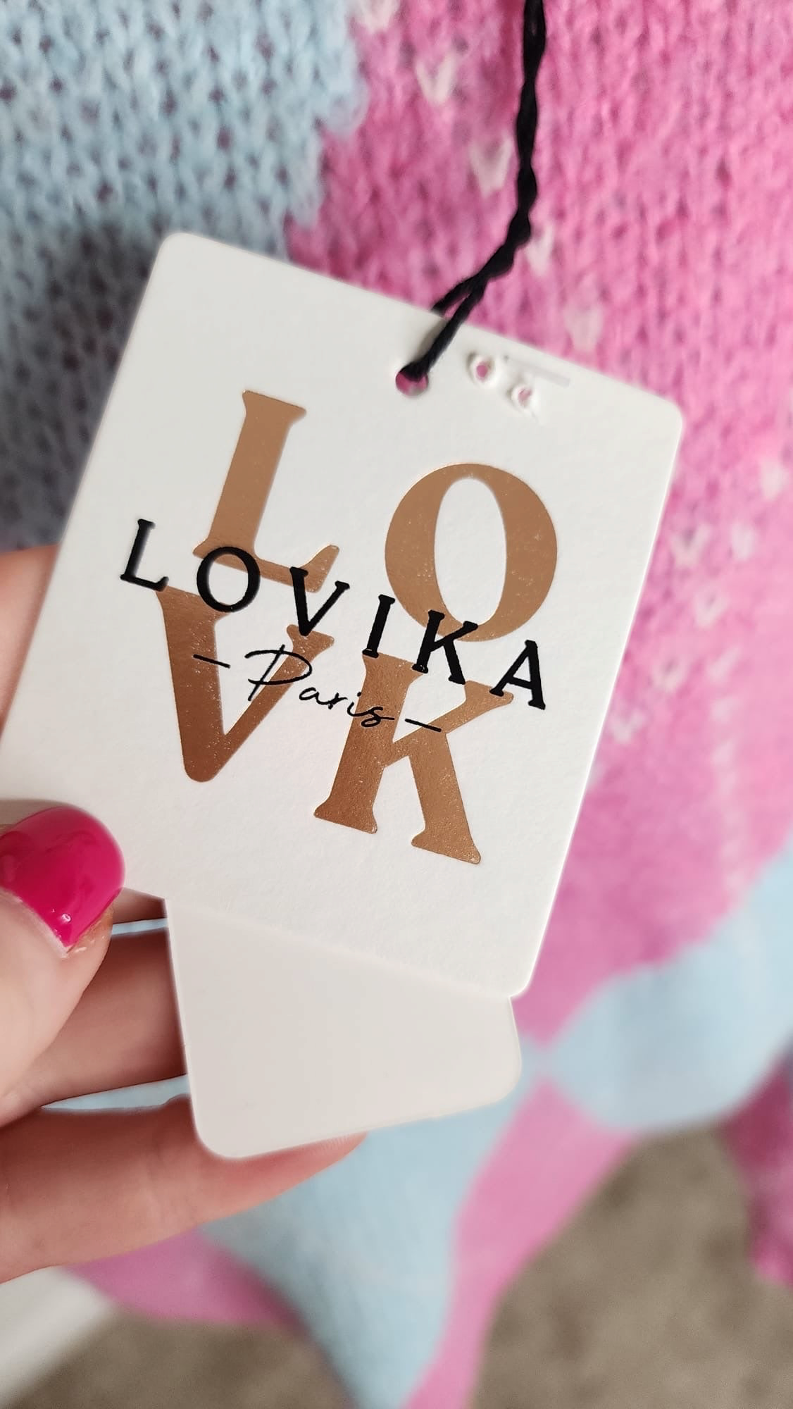 Style Reset LOVIKA Paris brand tag on a candy-pink and baby-blue argyle knitted jumper