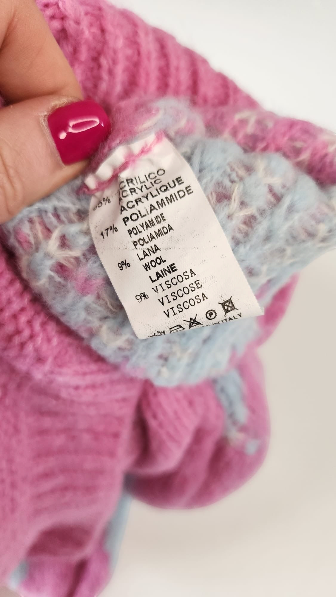 Style Reset LOVIKA Paris jumper fabric care label showing acrylic, polyamide, wool, and viscose blend composition