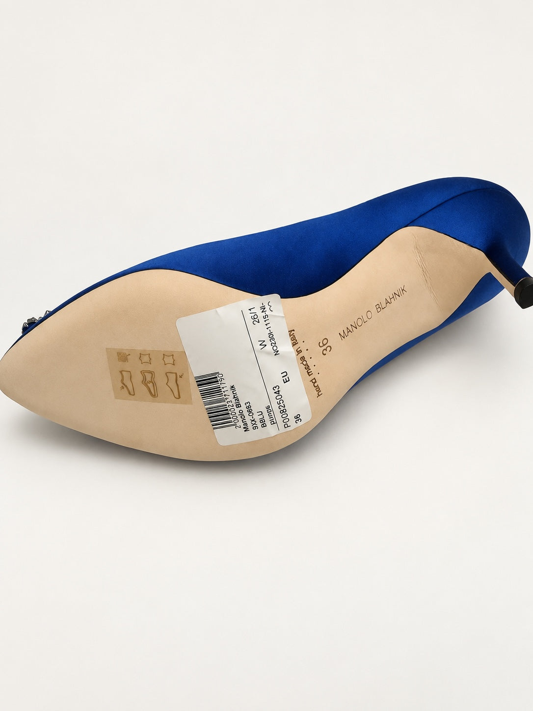 Style Reset Manolo Blahnik royal blue satin stiletto court shoe showing the leather sole and brand stamp