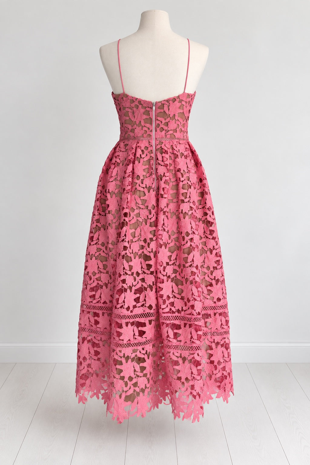 Style Reset pink floral lace midi dress with spaghetti straps, sweetheart neckline, and back zip on a mannequin.