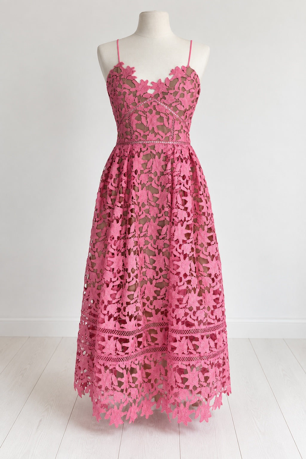 Style Reset pink floral lace midi dress with spaghetti straps, sweetheart neckline, and nude lining on a mannequin.