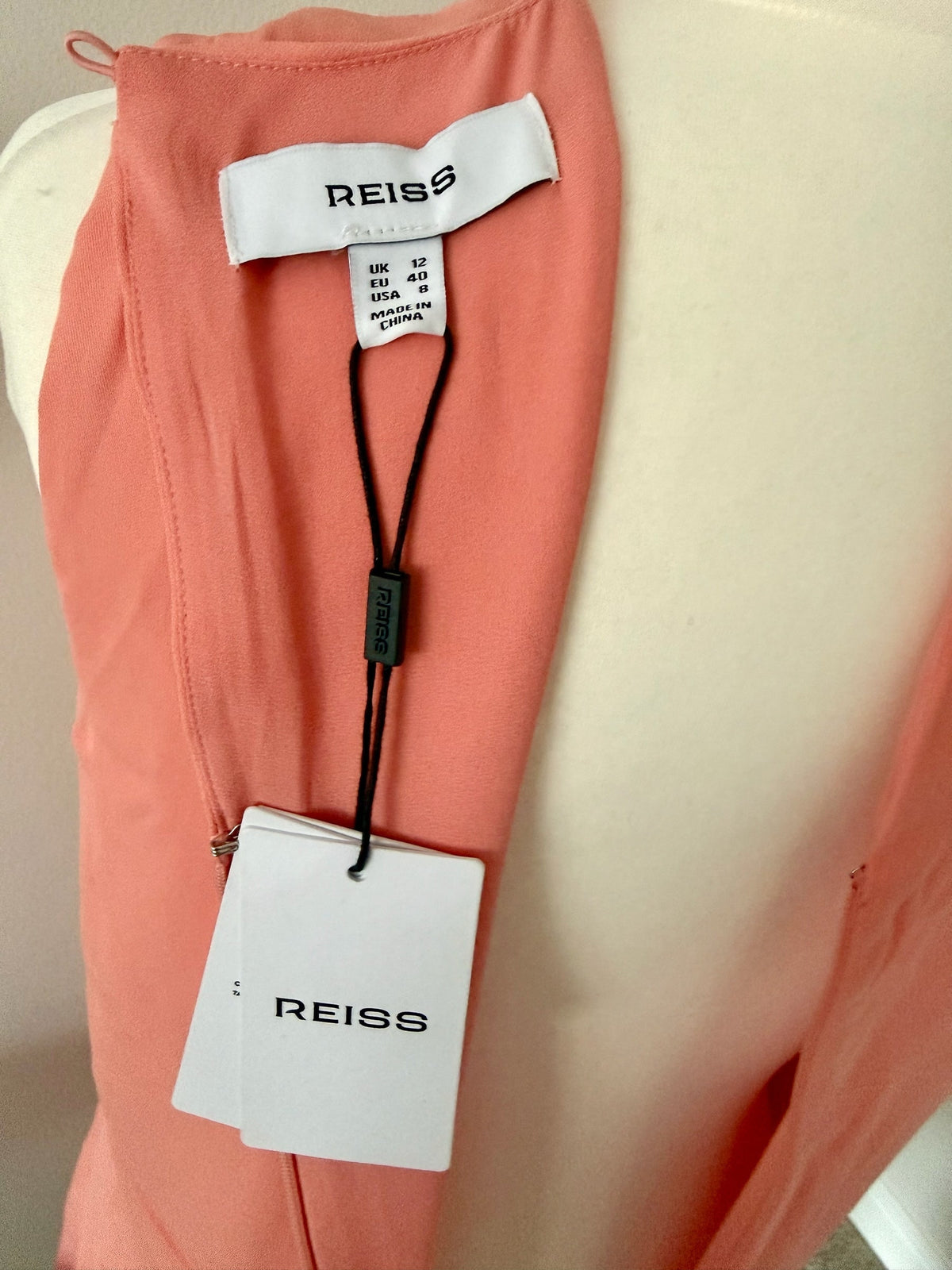 Style Reset REISS sleeveless coral midi dress with brand label and original tags attached
