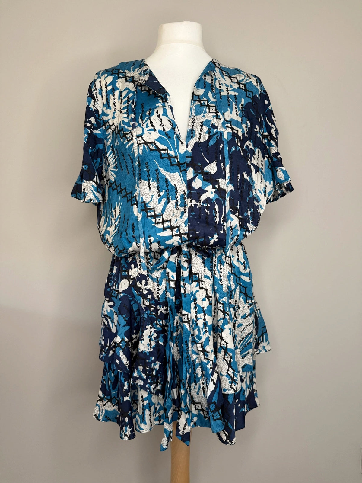 Style Reset REISS blue and white geometric floral print mini dress with shirt collar, button front, and tiered skirt.