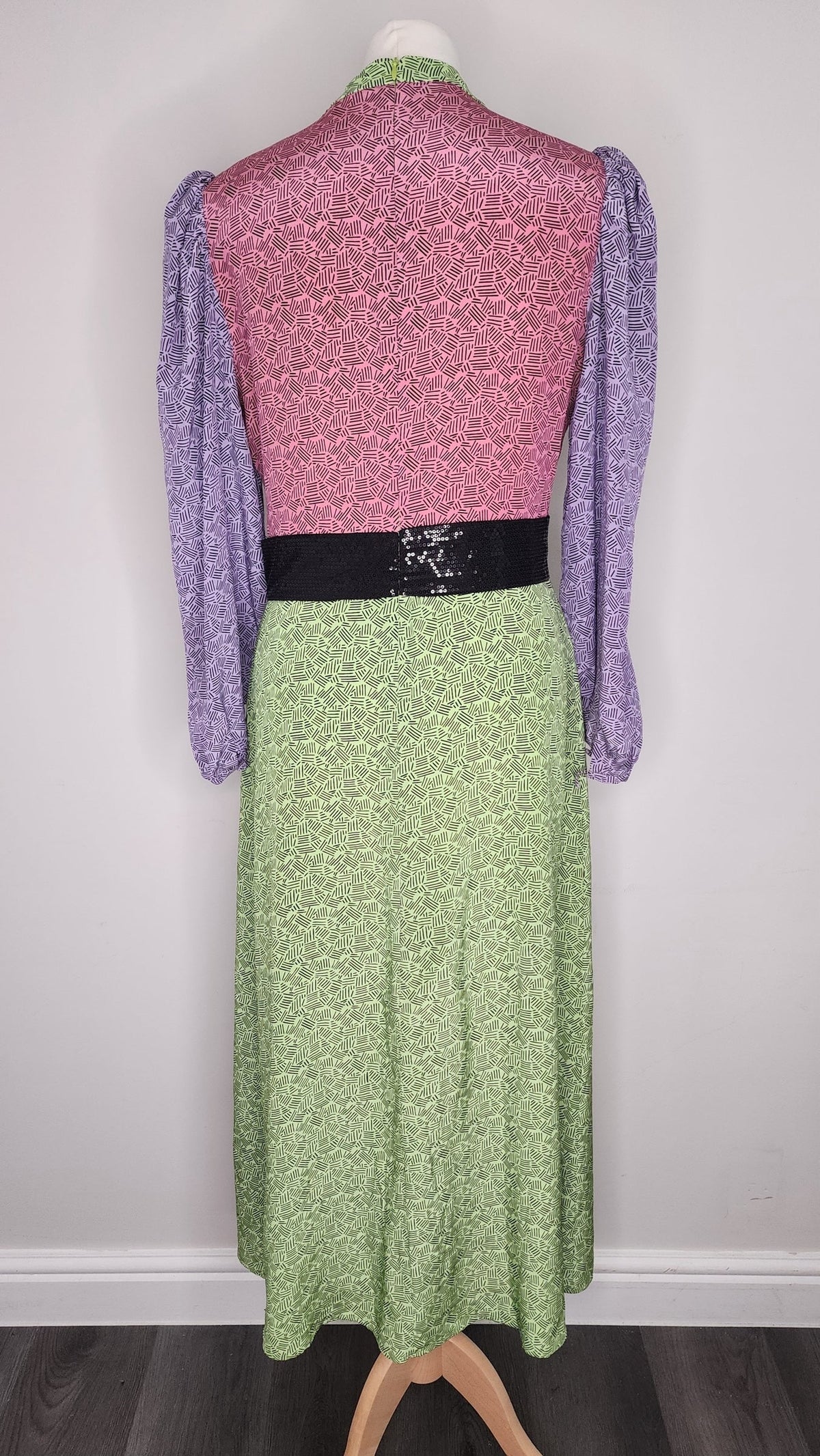 Style Reset Olivia Rubin silk midi dress with pink, lime green, and purple geometric print and black sequin waist belt