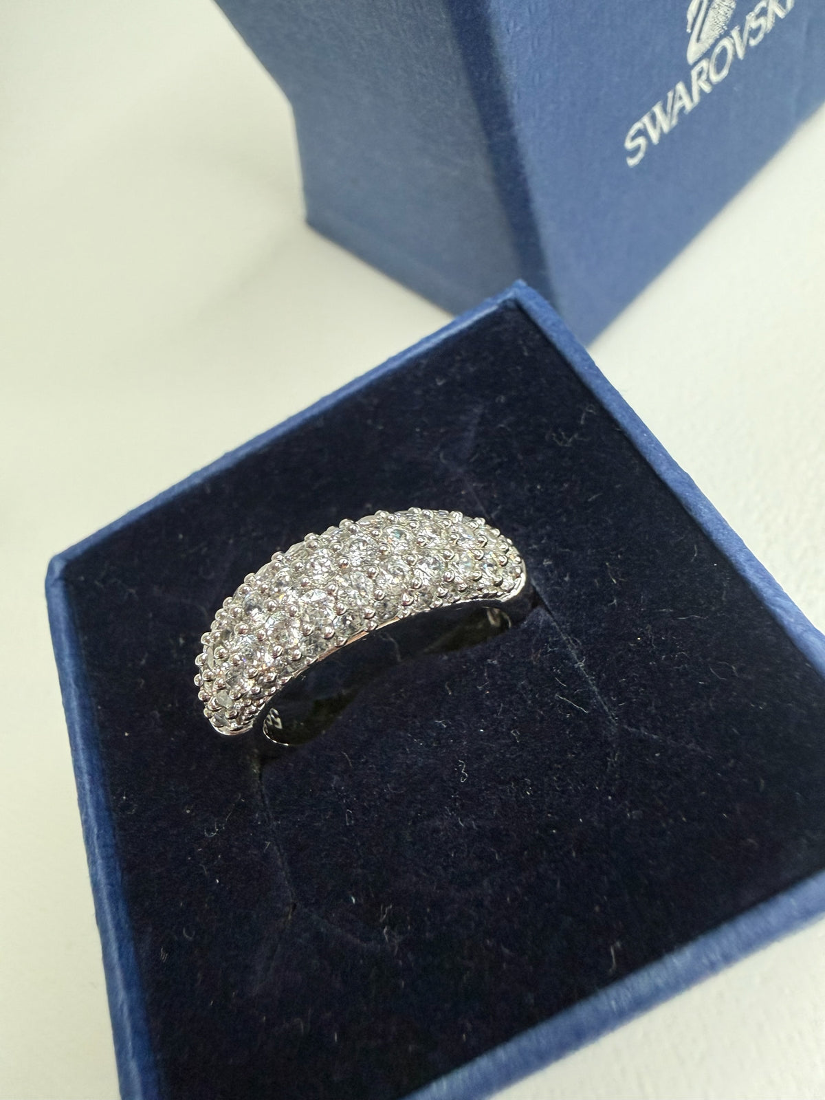 Style Reset Swarovski dome-shaped statement ring featuring dense pavé-set crystals in a polished silver-tone finish.