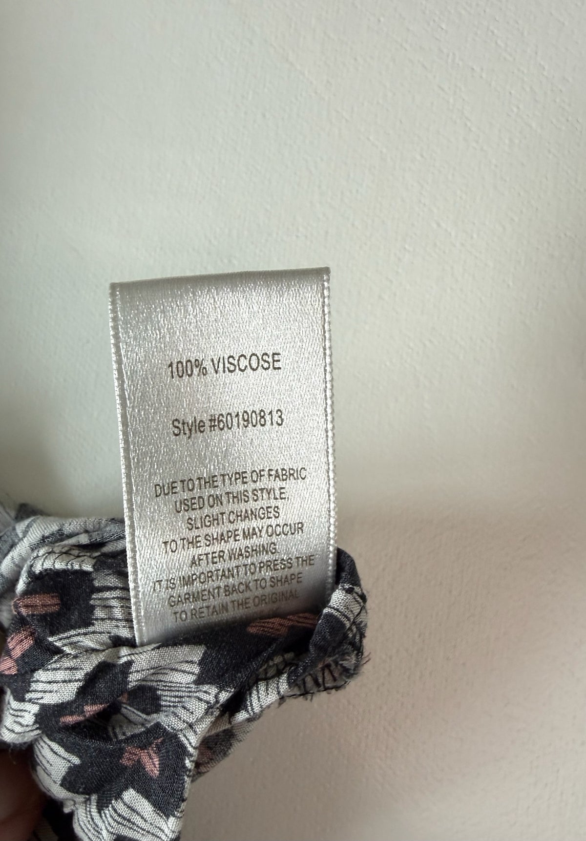 Style Reset WITCHERY maxi dress fabric care label showing 100% viscose composition and washing instructions