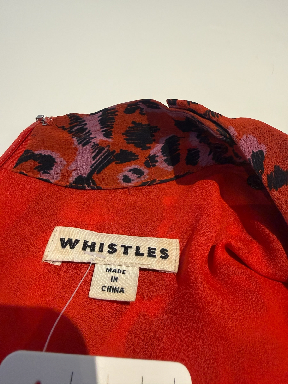 Style Reset Whistles red and black animal print midi dress label detail with high neck and back zip fastening