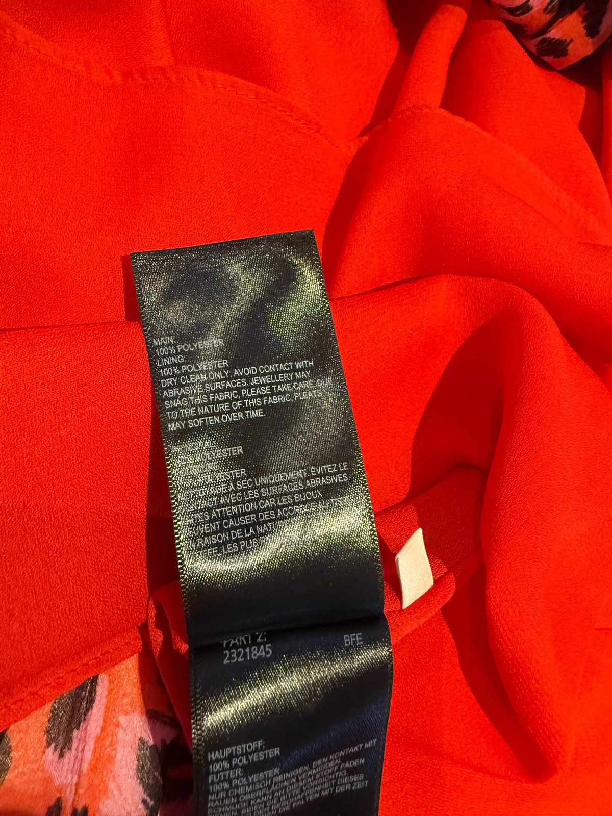 Style Reset Whistles midi dress red polyester fabric care label with dry clean instructions