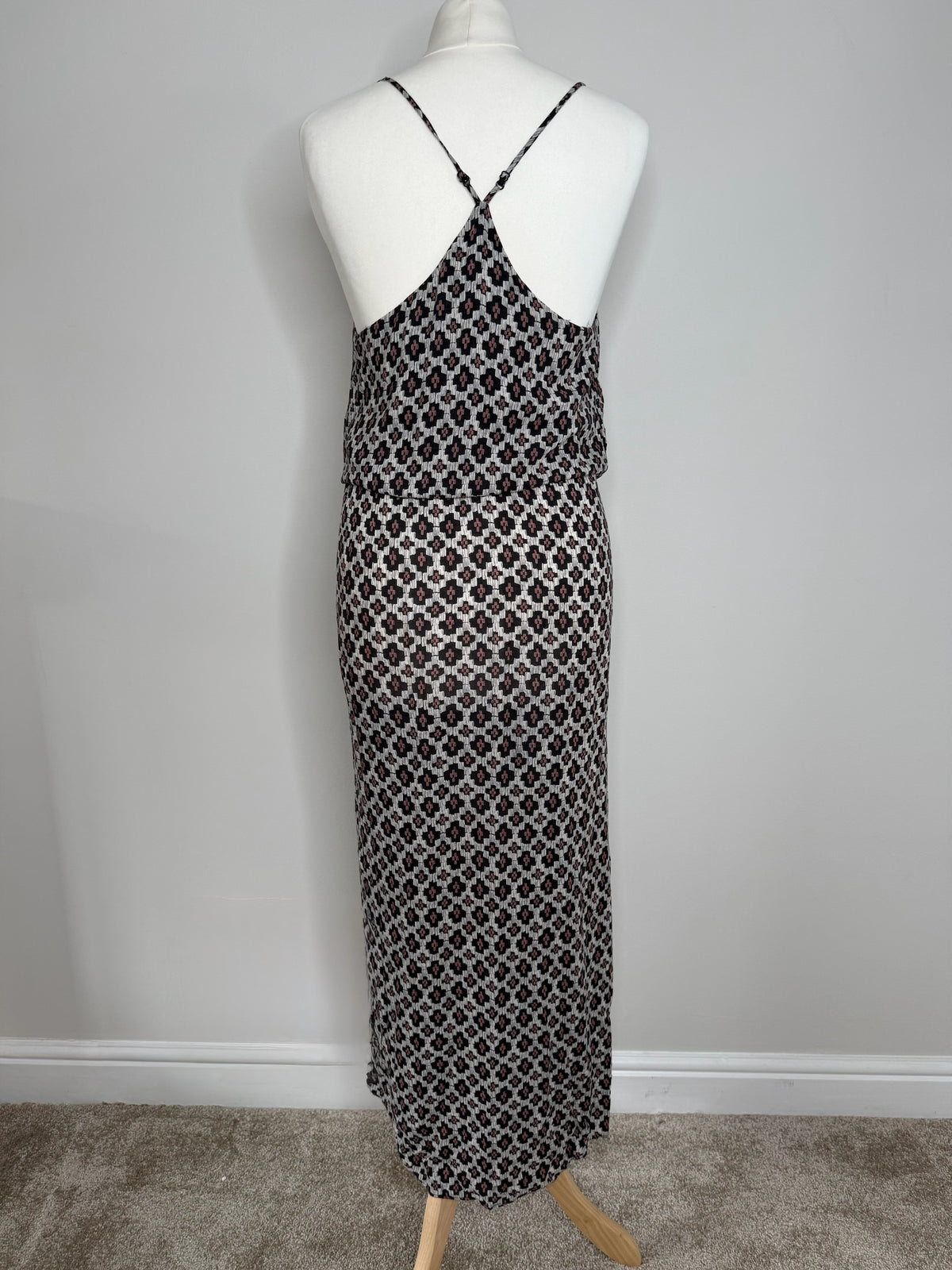 Back view of a Style Reset WITCHERY geometric print viscose maxi dress with spaghetti straps on a mannequin.